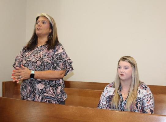 Van Zandt County Human Resource Director Jessica Deville (left) introduced new Assistant VZC Human Resource Director Emily Bettinger during the June 22 regular meeting of the VZC Commissioners Court. Bettinger began her new duties June 21. Photo by David Barber