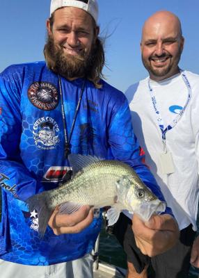 Guide Brandon Sargent (left) and Mike Hall, manager of Sapphire Bay Marina, with one of many slab crappie that landed on a recent trip with Luke. Photo by Luke Clayton