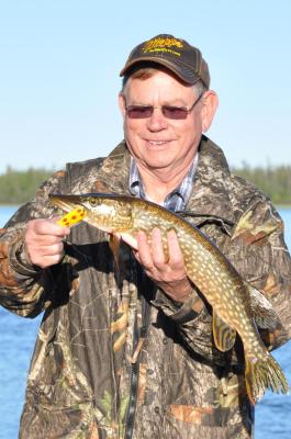 Spoons or their close cousin, the lead spoon (slab) we fish with here in Texas catch fish the world over. Luke is pictured with an ‘eater’ size northern pike in Saskatchewan caught on a Five of Diamonds spoon; a ‘go to’ bait in the far north. Photo by Phil Zimmerman