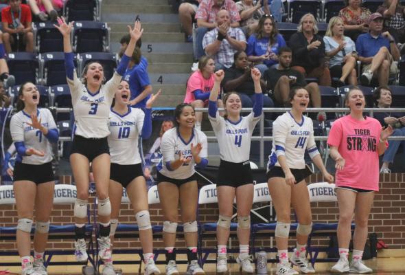 Wills Point players erupt in cheers after a hard-fought point during the Oct. 21 matchup between the Lady Tigers and the visiting Sunnyvale Lady Raiders. Photo by David Kapitan