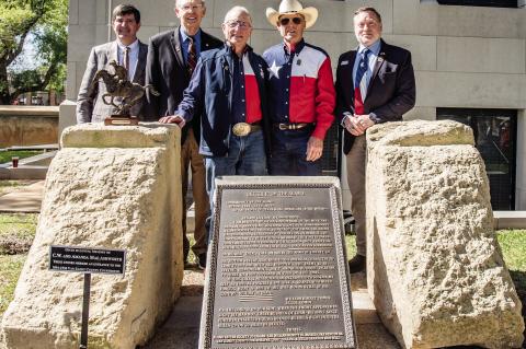 Bronze plaque dedicated at courthouse